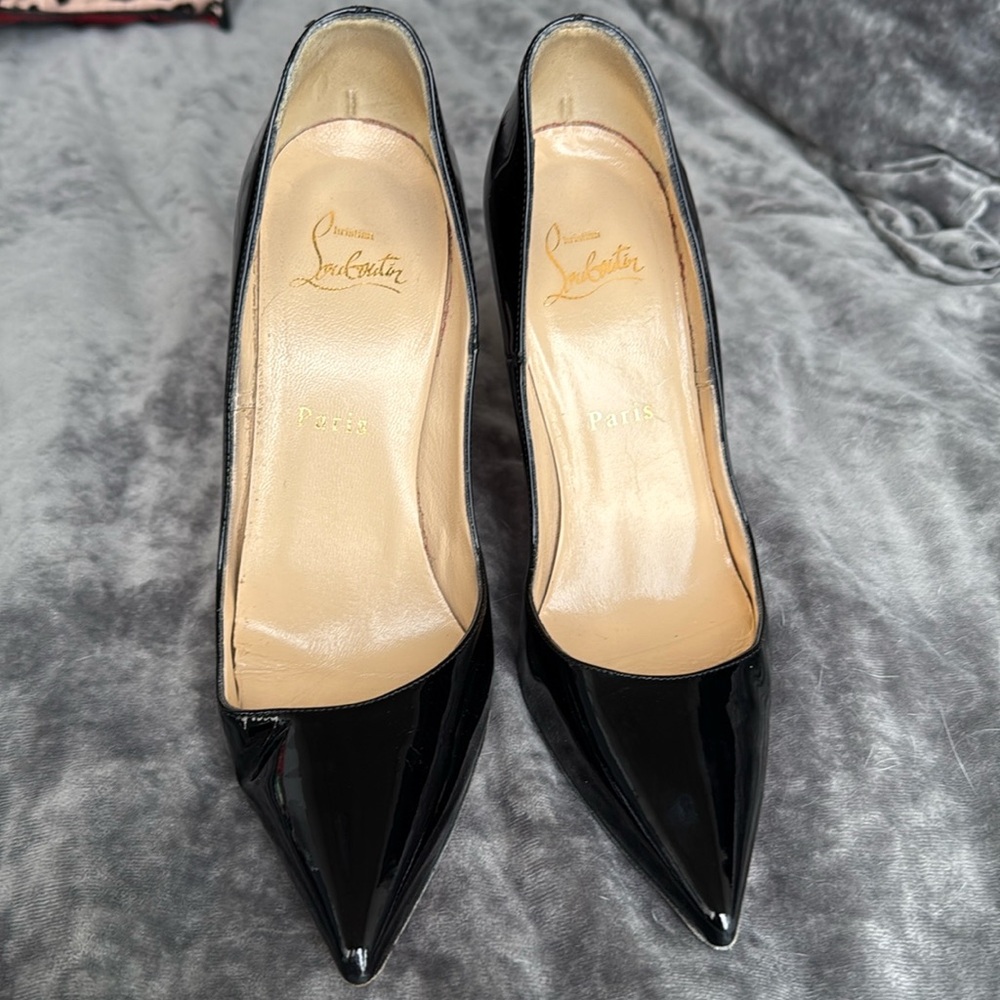 Christian Louboutin black patent pumps